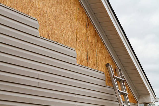 Professional Storm Damage Siding Repair technician working in Nanty Glo, PA